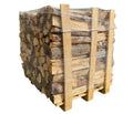 Palette contenant 1,5 mètre cube de bois d'une épaisseur de 50 cm – un mélange de bois durs